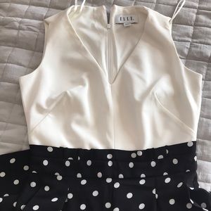 Brand new without tags jumpsuits with polka dot details in black and white